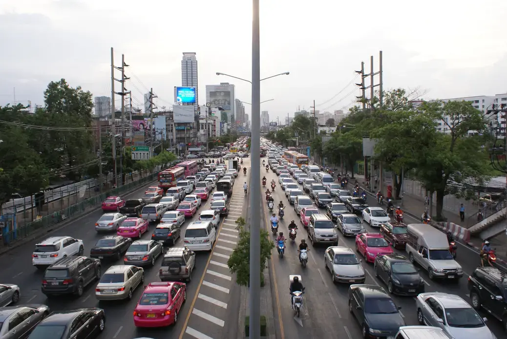 An endless traffic jam in Khlong Toei, Bangkok. Public infrastructure has been slow to accommodate the city's rapid growth. Image by Adam Janofsky. Thailand, 2012. Media file: Traffic.JPG