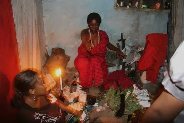 Fatuma among her devotees. Image by Mary Wiltenburg. Tanzania, 2011.