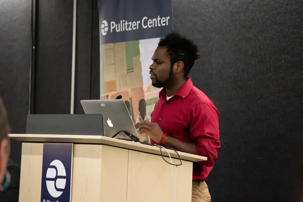 Joel Luke Van Alstine from Westchester Community College presents his reporting on adoption practices in Haiti. Image by Nora Moraga-Lewy. United States, 2019.