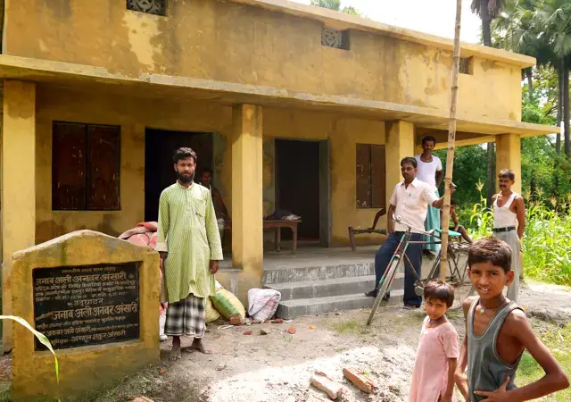 Ali Akbar Ansari outside the new community hall that will be a school in the morning. "Everyone is welcome," he says, "but I know the upper caste Muslims will not come here." Image by Shivam Vij. India, 2011. Media file: allahpur2.jpg