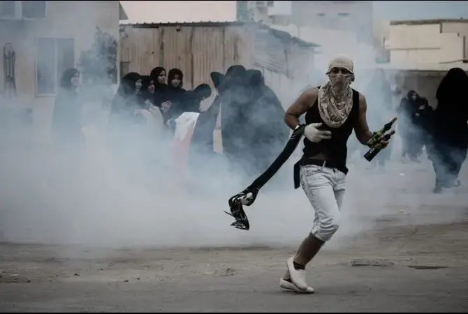 Frustrated by a lack of progress, a younger, more militant faction of Bahrain’s reform movement is threatening violence. (AFP/AFP/Getty Images) Media file: bahrainprotests-uprising-youth-violence.jpg
