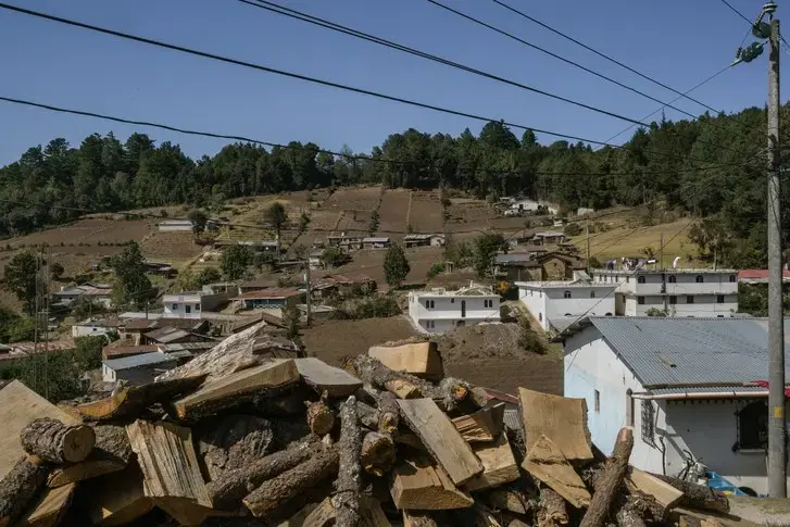 The practice of cutting trees to sell for firewood, which was growing increasingly common in the area, has steadily deforested the region around Totonicapán. Image by Mauricio Lima. Guatemala, 2019.