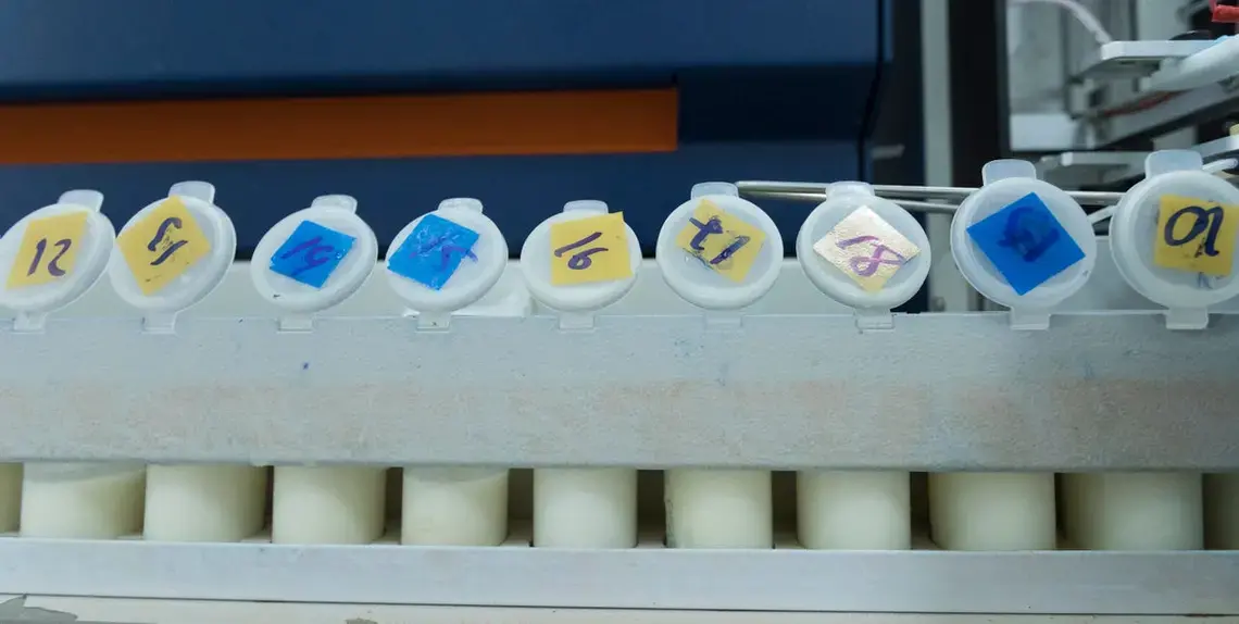 Milk samples are tested at TH Milk's operations in Nghia Son, Vietnam. The company controls the product from start to finish including packaging. Image by Mark Hoffman. Vietnam, 2019. 