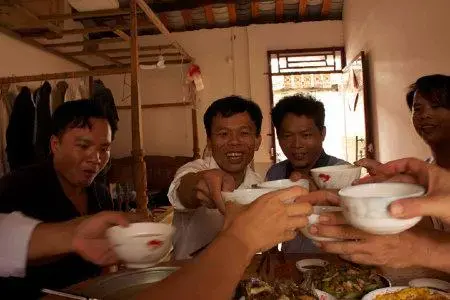 Men gather in Gao Po where the discussion turns to the topic of women. Image by Deborah Jian Lee and Sushma Subramanian. China, 2011. Media file: chinabachelors.jpg
