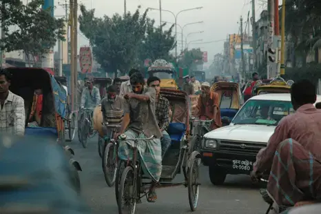In Dhaka the best form of transportation is often a bicycle rickshaw. Image by Dan Grossman. Bangladesh, 2009. Media file: dhaka466.jpg