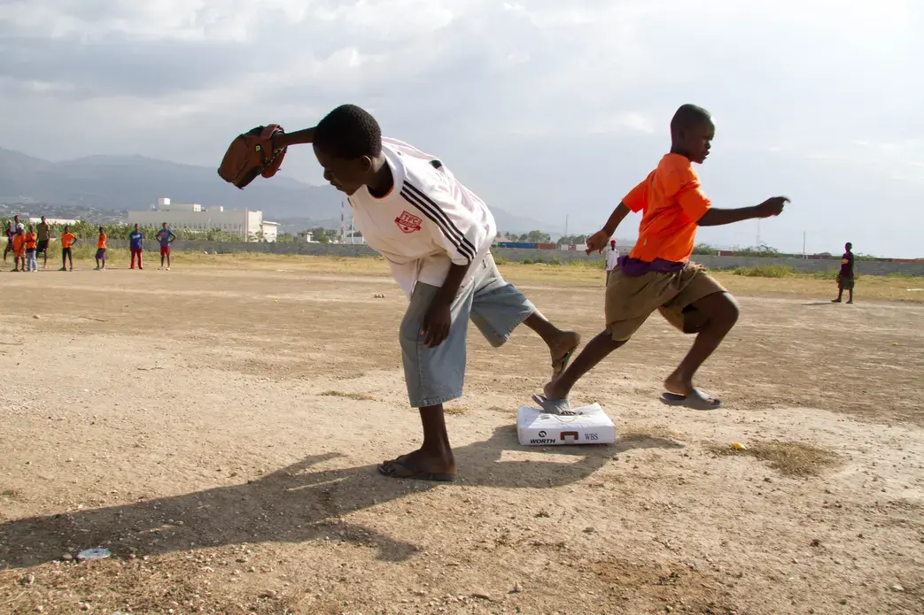 The Tabarre Tigers, Haiti's only little league team, practices on a Saturday afternoon in Port-au-Prince. Image by Meghan Dhaliwal. Haiti, 2012. Media file: dhaliwal-5217.jpg