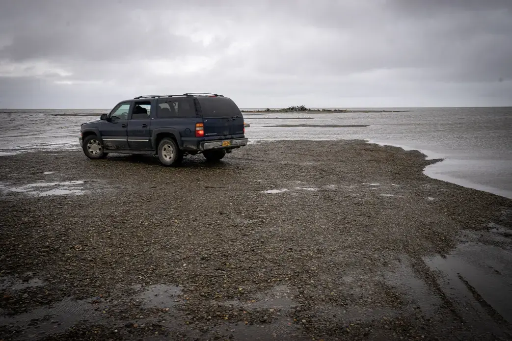 Robert's car parked along coastal shore. Image by Nick Mott. United States, 2019.