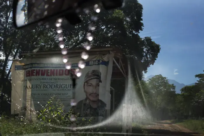 The entrance into the zone of reincorporation of the ex-combatants of the FARC in the area known as Pondores. Image by Fabio Cuttica. Colombia, 2018. 