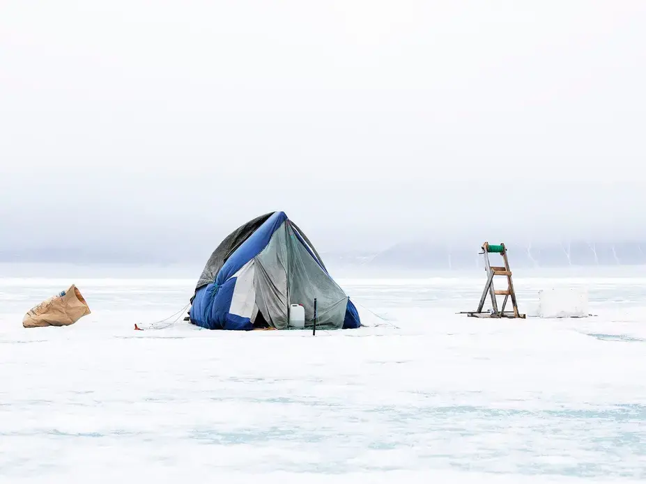 Despite the dangers of the sea ice, some hunters camp out there during the hunting season. Greenland, 2019. Image by Anna Filipova. 