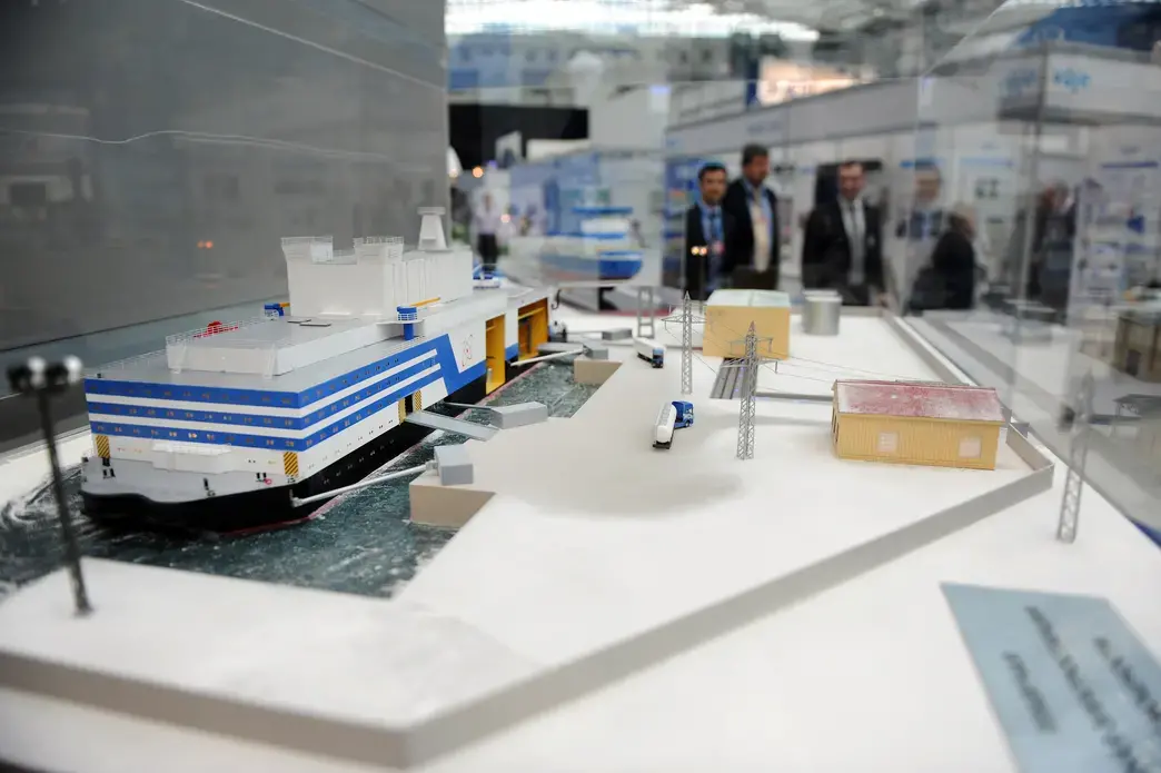 A model of Russia's floating nuclear power station on display at the Russian "ATOMEXPO" held in June in Moscow. The floating station and the "universal" icebreaker are based on similar designs and will likely run on compact, RITM-200 reactors. Photo by James Hill. Russia, 2012. Media file: floating nuke.jpg