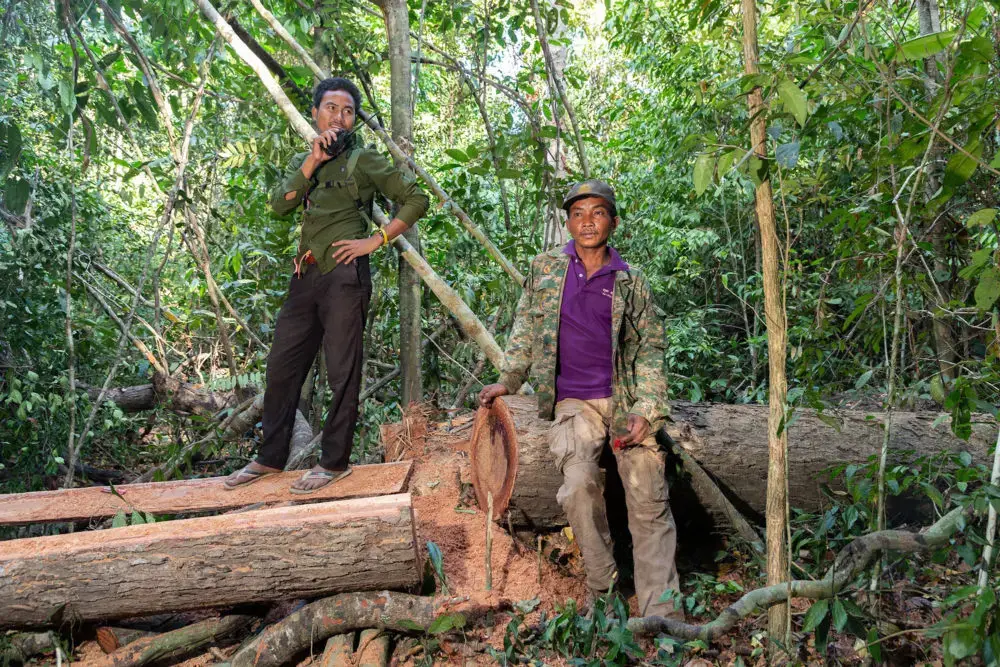 Members of the Prey Lang Community Rangers monitoring illegal logging. Prey Lang is one of Asia's last remaining lowland evergreen woodlands. Image by Sean Gallagher. Cambodia, 2020.<br />
