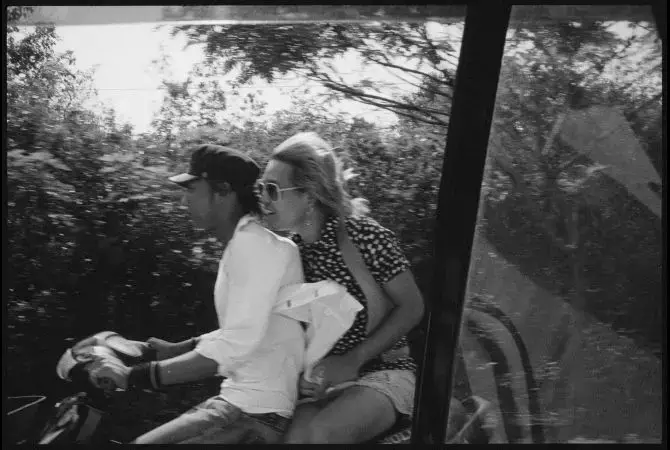 A young couple rides a motorcycle from Puin Oo Lin to Mandalay on the Burma Road. Image by Gary Knight. Burma, 2012. Media file: gmk_bur__025.jpg