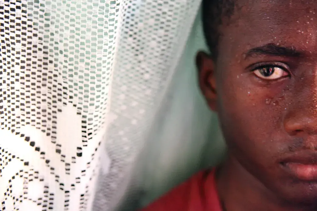 Alex, 17, lives in Haiti with HIV. “I would like to sing, but to make a song, I need to feel it inside myself. Sometimes I need to be happy. When I am happy, I can make a song.” Image by Andre Lambertson. Haiti, 2010. Media file: haiti-andre-lambertson.jpg