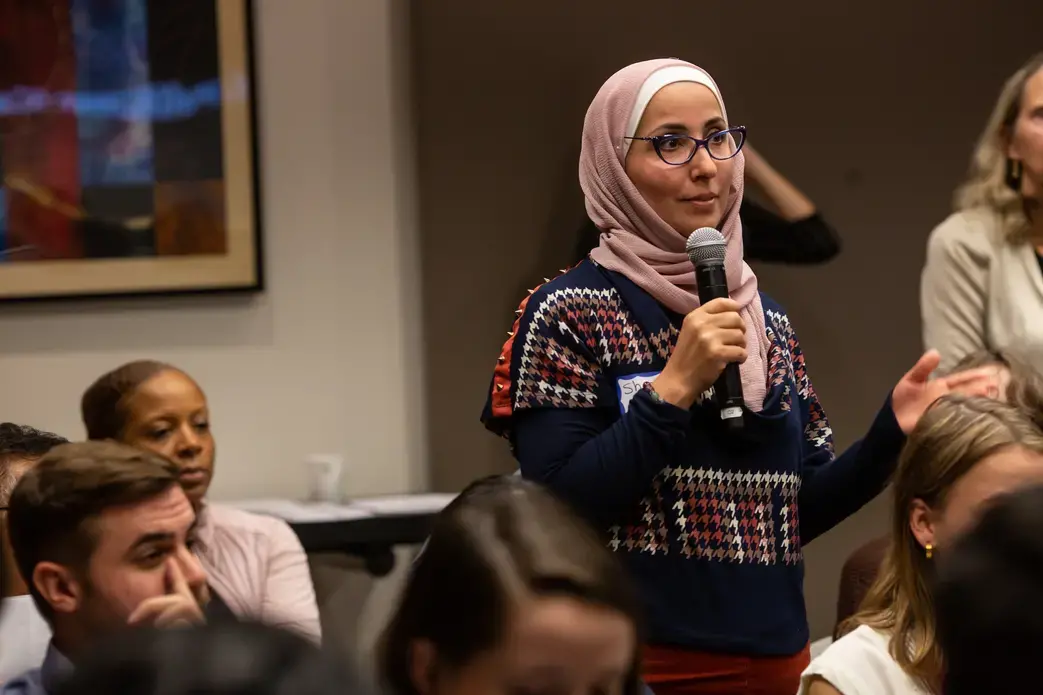 Shirin Alhroob (Forsyth Technical Community College) poses a question during an audience Q&A session for Day One of Washington Weekend. Image by Claire Seaton. United States, 2019.