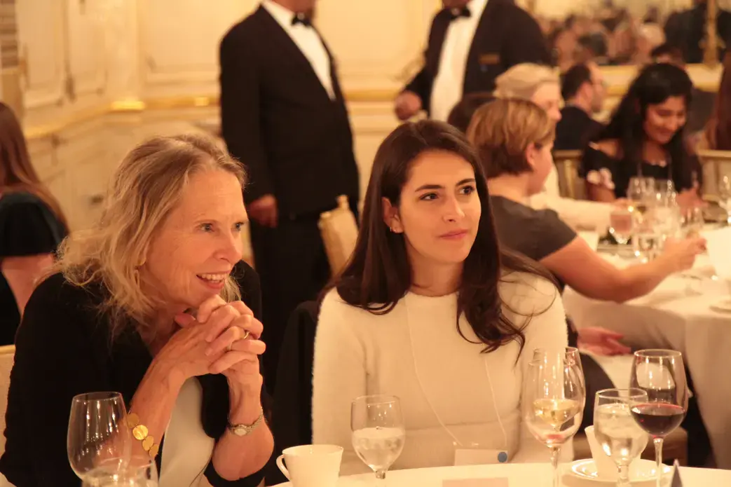 Kem Sawyer, contributing editor at the Pulitzer Center, and Mariana Rivas, Reporting Fellow from Texas Christian University, at the Cosmos Club. Photo by Libby Moeller. United States, 2019.