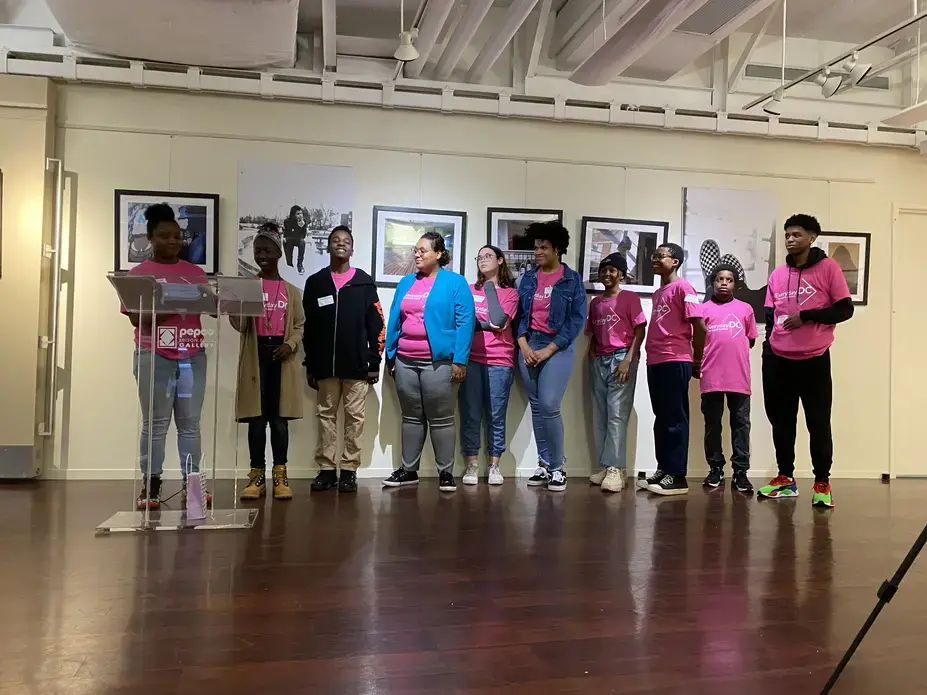 The Everyday DC student curators give their opening address, outlining the exhibition's background, aims, as well as their curation process. Photo by Lea Waldridge. Media file: l3.jpg