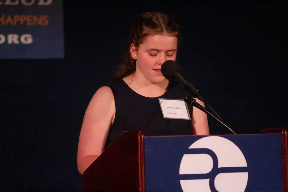 Beatrix Stone reads from her poem after a photo by Eloisa Lopez in 'The Filipino Catholic Church in Crisis' by Adam Willis. Image by Jin Ding. United States, 2019.</p>
<p>