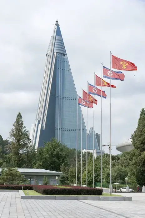 A view of the Ryugyong Hotel from the Victorious Fatherland Liberation War Museum. Image by Max Pinckers/The New Yorker. North Korea, 2017.