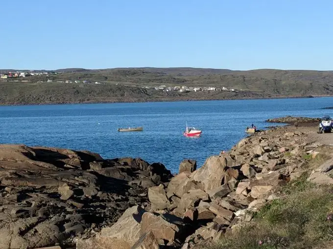 Fishing at the Iqaluit causeway is affordable but is only possible during six weeks of the summer. Image by Julie De Meulemeester. Canada, 2018.<br />
