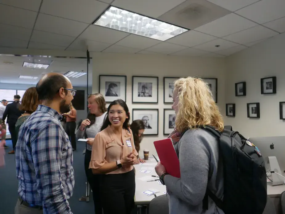 Fareed Mostoufi, senior education manager at the Pulitzer Center, Micah Castelo, Reporting Fellow from Syracuse University, and Melissa Chessher, Syracuse University journalism professor, at the Pulitzer Center. Image by Meerabelle Jesuthasan. United States, 2019.