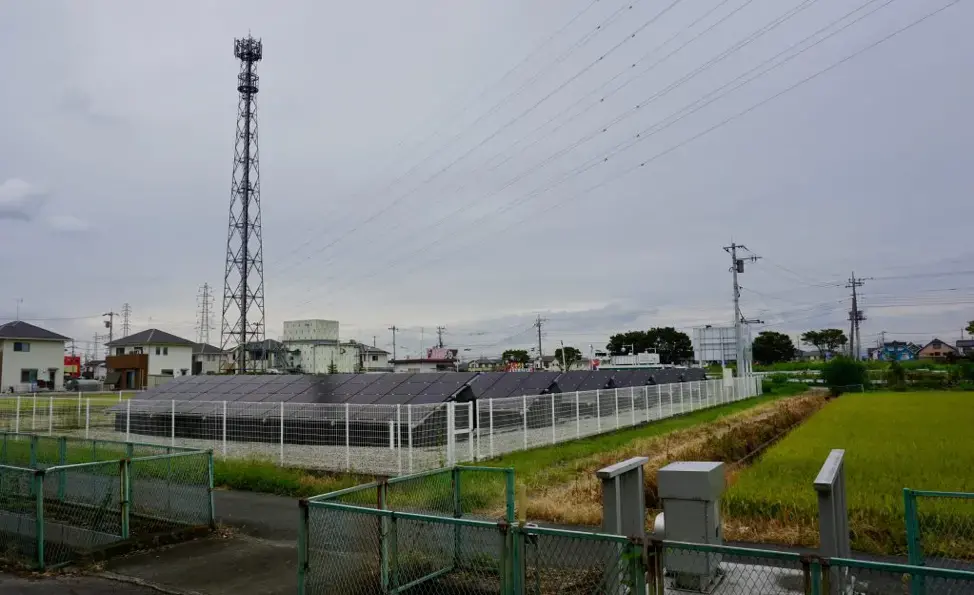 Solar panels and rice fields in Kumagaya, Saitama, Japan. Image by Daniel Merino. Japan, 2019.
