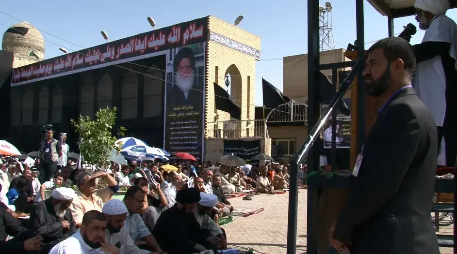 Friday prayers in Sadr City. Image by David Enders. Iraq, 2011.