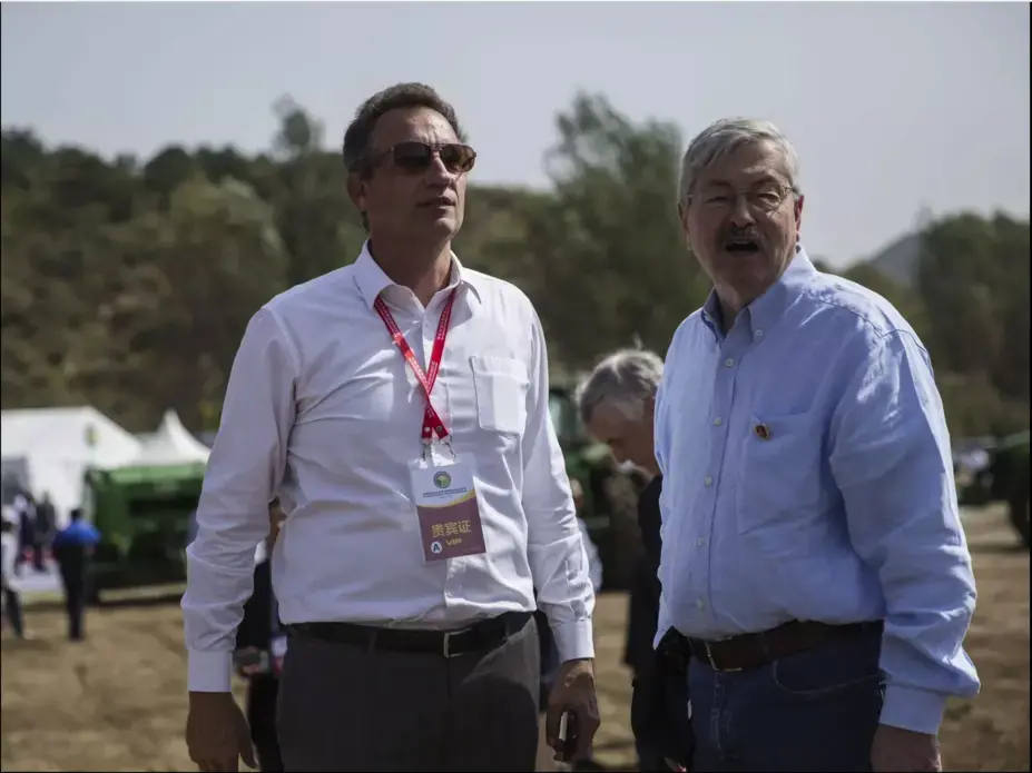 Gary Dvorchak, left, a Muscatine native who now lives and works in Beijing, China, and Terry Branstad, U.S. ambassador to China, attend the groundbreaking of the China-U.S. Demonstration Farm on Saturday, Sept. 23, 2017, in Luanping County, Hebei. Image by Kelsey Kremer. China, 2017. 