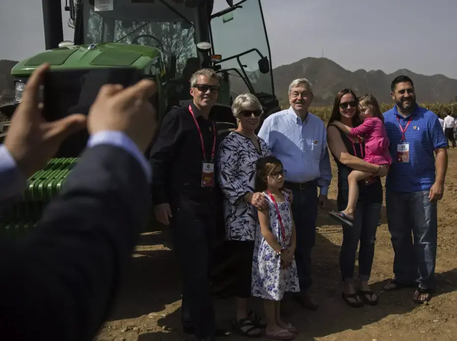 U.S. Ambassador to China Terry Branstad and his family pose for a photo on the China-U.S. Demonstration Farm during its groundbreaking ceremony on Saturday, Sept. 23, 2017, in Luanping County, Hebei, China. Image by Kelsey Kremer. China, 2017.