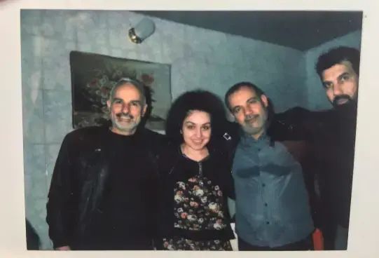 Zahra Ahmad poses for a picture with her uncles Yousef Sibte, left, Younnes Sibte, right, and Rasul Sibte, far right. Image courtesy of Ahmad family.