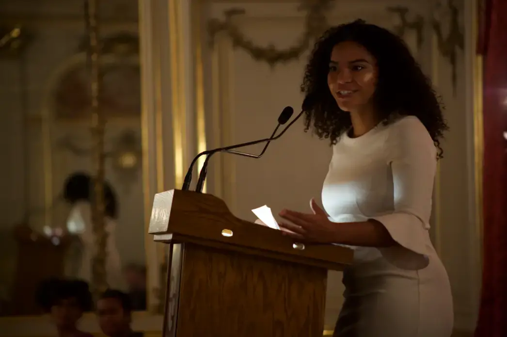 Camila DeChalus speaks at the Cosmos Club during Washington Weekend about her experiences both as a 2016 Pulitzer Center Reporting Fellow and as a staff reporter at CQ Roll Call. Image by Claire Seaton. United States, 2019.