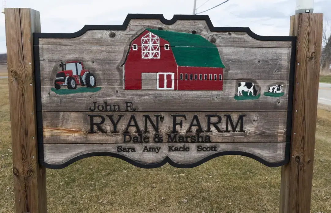 A sign is shown at the farm of Dale and Marsha Ryan in Belleville. Image by Mark Hoffman. United States, 2019.