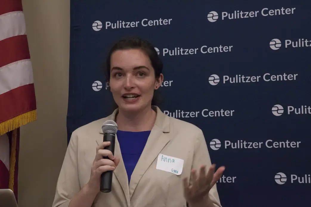 Anna Russell from The George Washington Univesity Milken Institute School of Public Health reports on 'Haiti’s Forgotten Health Crisis: Women’s Cancers.' Image by Jin Ding. Washington, DC, 2017.