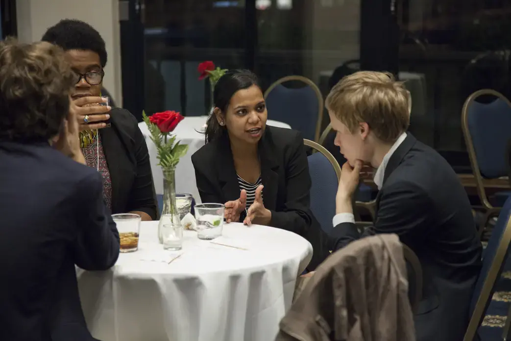 University of Michigan student fellow Esohe Osabuohien, South Dakota State University student fellow Palak Barmaiya and University of Chicago student fellow at the National Press Club dinner. Image by Jin Ding. Washington, DC, 2017.