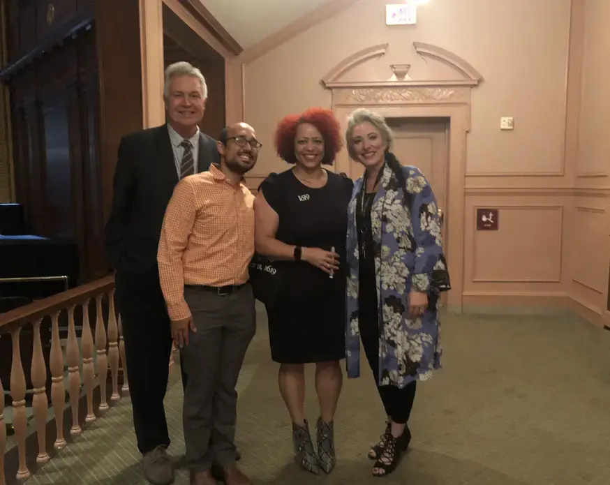 Pulitzer Center's founder and Executive Director Jon Sawyer, Pulitzer Center's Senior Education Manager Fareed Mostoufi, New York Times journalist Nikole Hannah-Jones, and Reynolds High School Arts Magnet Director Pamela Henderson-Kirkland pose for a photo after the discussion. Image by Kem Knapp Sawyer. United States, 2019.