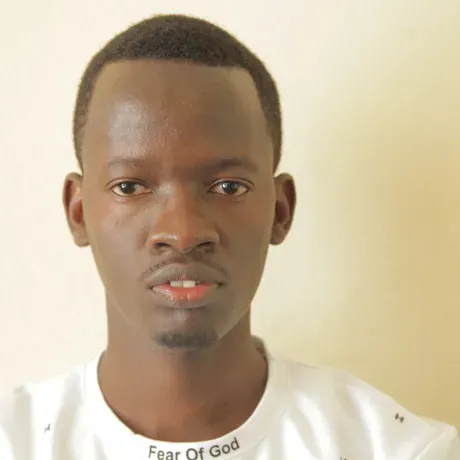 A person wears a white shirt.