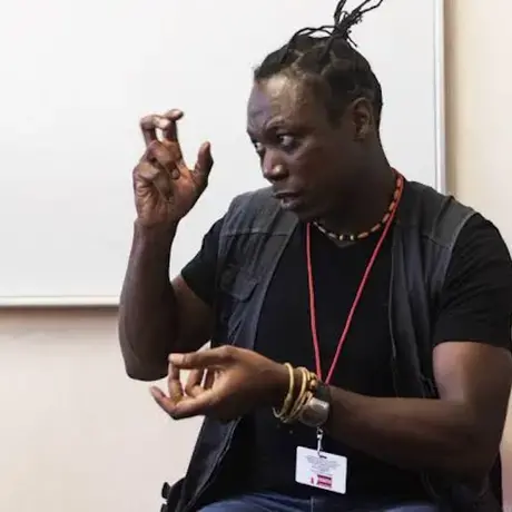 Image of Estacio giving a talk