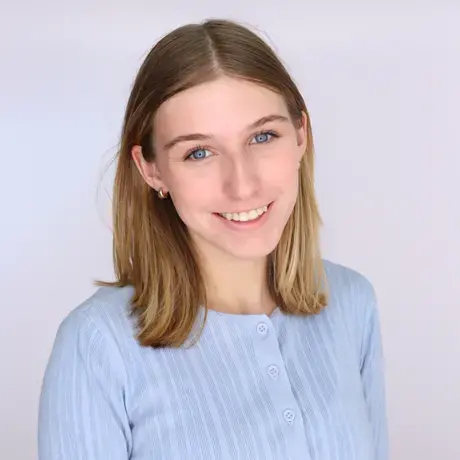Headshot of Georgia with blue shirt