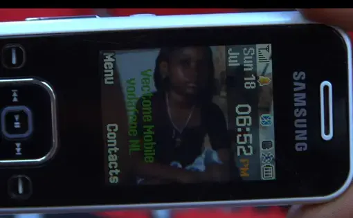 Media file: 007 kylah's picture on cell phone.jpg