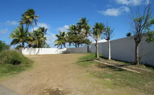 This empty plot of land is where Adolfina's house stood. Image by Isabel Sophia Dieppa. United States, 2018.