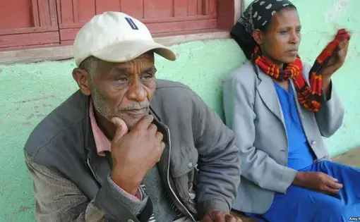 Beyebo Eresado and a fellow villager describe how their community in southern Ethiopia stopped female genital mutilation. Image by Amy Yee. Ethiopia, 2016.