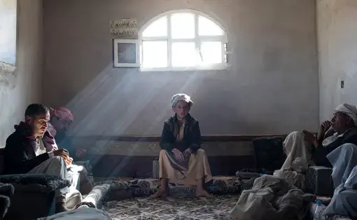 Abdullah Abed al-Abdeli, age 12, whose father died in an airstrike in Northern Yemen. Image by Tyler Hicks/The New York Times. Yemen. 2018.