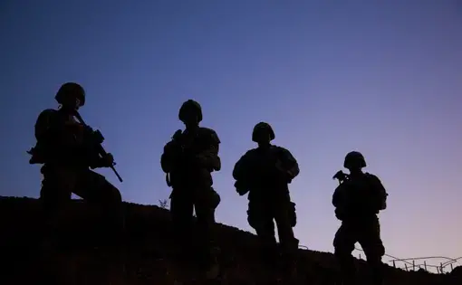 Silhouetted U.S. Army paratroopers. Image by Cpl. Rachel Diehm/U.S. Army (public domain). Iraq, 2017.