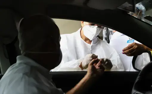 The Rio de Janeiro city hall performs coronavirus tests on taxi drivers at Sambodromo. Image by&nbsp;Andre_MA / Shutterstock. Brazil, 2020.