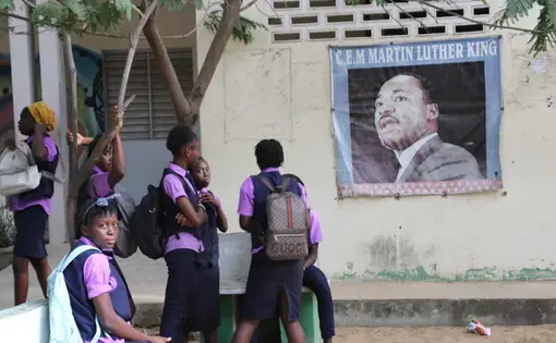Students at Martin Luther King Jr. Middle School in Dakar, Senegal, relax after classes. Image by Michelle Tyrene Johnson. Senegal, 2019.