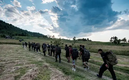 Bihac, Bosnia-Herzegovina: A group of Pakistanis is seen as they are making their way to Croatia over the mountain Plješevica. Bihac and the north-western part of the country is taking the brunt of the escalating crisis. Being in proximity of the border with Croatia it is a logical route for the people on the move. Image by Ziyah Gafic. Bosnia-Herzegovina, 2020.