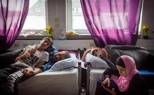 Milad's family. Image by Diana Markosian. Germany, 2017.