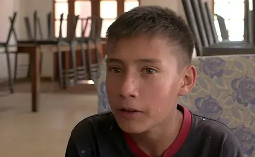 Natan Tobias, 13, said he was frightened after authorities brought him to an orphanage near Cochabamba. "I was afraid. I didn't even want to come out of my room." Image by Tracey Eaton. Bolivia, 2017.