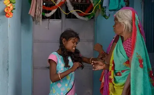 On a short fuse: Rajni Panti, 21, a resident of one of the areas affected by the toxic gas leak in Bhopal, is always angry, earning the wrath of her neighbours who sometimes hit her back. Multiple disabilities have made this child of Bhopal gas leak survivors shy and irritable. Image by Rohit Jain. India, 2018.