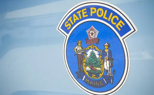 A Maine State Police cruiser is pictured outside the Penobscot County Jail on May 12, 2020. Credit: Natalie Williams / BDN.