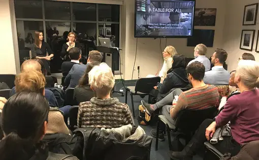 Filmmakers and Columbia Journalism School student fellows Liz Scherffius and Thea Piltzecker speaking on a panel after the screening of their film, A Table for All. Image by Elana King-Nakaoka. United States, 2019.